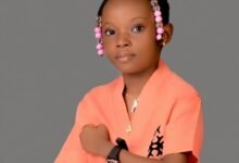 9-year-old Nigerian girl teaching mathematics