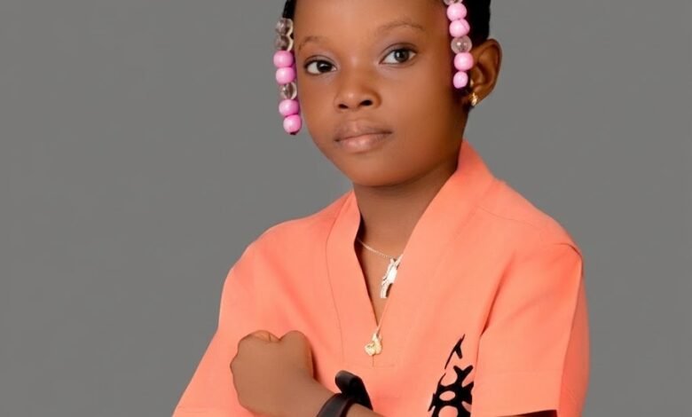 9-year-old Nigerian girl teaching mathematics